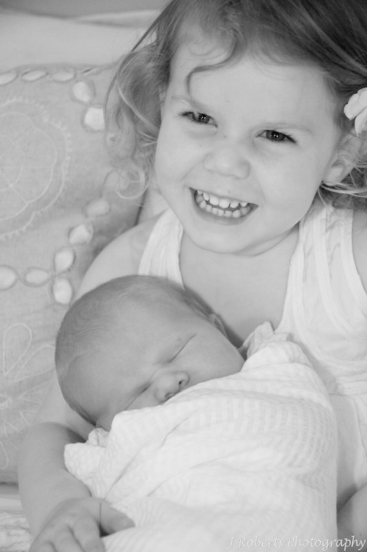 Big sister with baby - newborn portrait photography